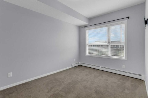 323-4150 Seton Drive Se, Calgary, AB - Indoor Photo Showing Other Room