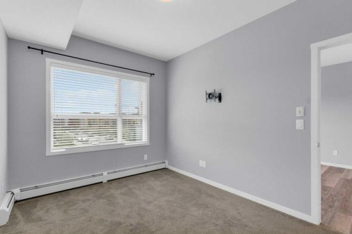 323-4150 Seton Drive Se, Calgary, AB - Indoor Photo Showing Other Room