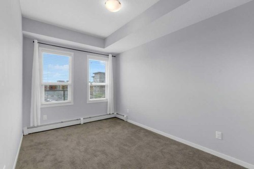 323-4150 Seton Drive Se, Calgary, AB - Indoor Photo Showing Other Room