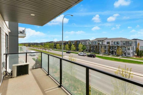 323-4150 Seton Drive Se, Calgary, AB - Outdoor With Balcony With View With Exterior