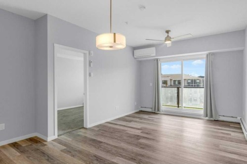323-4150 Seton Drive Se, Calgary, AB - Indoor Photo Showing Other Room