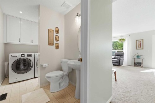 46 Somerside Place Sw, Calgary, AB - Indoor Photo Showing Laundry Room