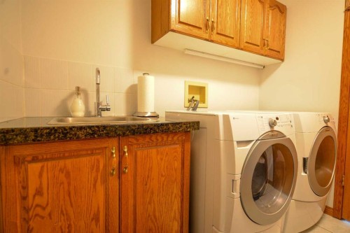 393 Hawktree Circle Nw, Calgary, AB - Indoor Photo Showing Laundry Room