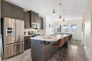 193 River Heights Drive, Cochrane, AB  - Indoor Photo Showing Kitchen With Upgraded Kitchen 