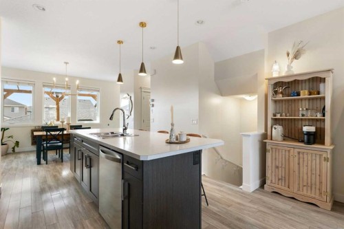 193 River Heights Drive, Cochrane, AB - Indoor Photo Showing Kitchen With Upgraded Kitchen