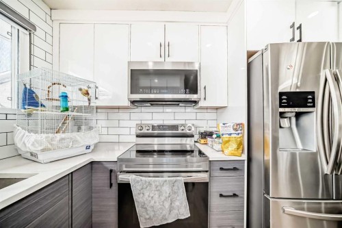 12 Rundleson Way Ne, Calgary, AB - Indoor Photo Showing Kitchen With Stainless Steel Kitchen With Upgraded Kitchen