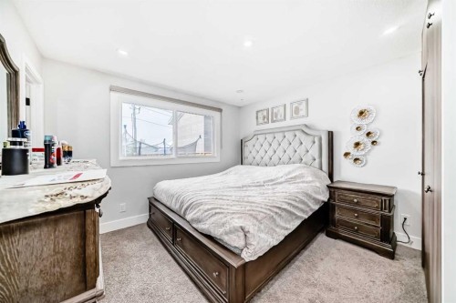 12 Rundleson Way Ne, Calgary, AB - Indoor Photo Showing Bedroom