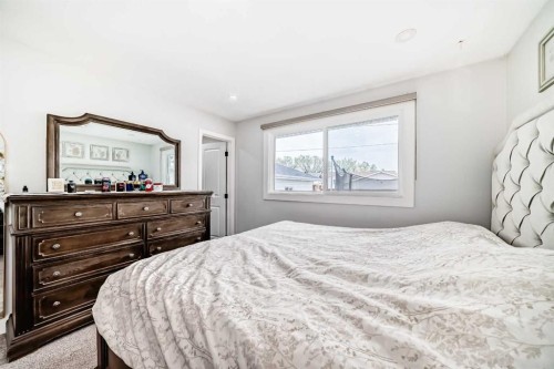 12 Rundleson Way Ne, Calgary, AB - Indoor Photo Showing Bedroom