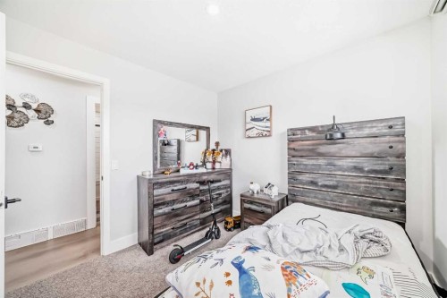 12 Rundleson Way Ne, Calgary, AB - Indoor Photo Showing Bedroom