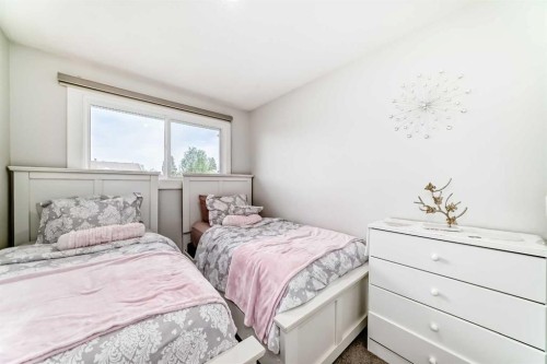 12 Rundleson Way Ne, Calgary, AB - Indoor Photo Showing Bedroom