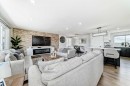 12 Rundleson Way Ne, Calgary, AB  - Indoor Photo Showing Living Room With Fireplace 