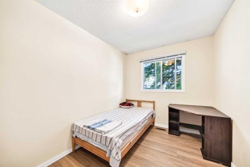 5051 Vantage Crescent Nw, Calgary, AB - Indoor Photo Showing Bedroom