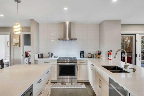 760 West Chestermere Drive, Chestermere, AB - Indoor Photo Showing Kitchen With Double Sink With Upgraded Kitchen