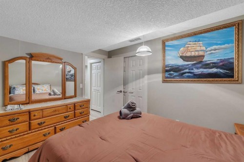 760 West Chestermere Drive, Chestermere, AB - Indoor Photo Showing Bedroom