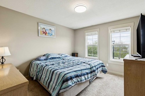248 Cascades Pass, Chestermere, AB - Indoor Photo Showing Bedroom