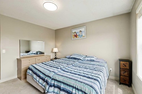 248 Cascades Pass, Chestermere, AB - Indoor Photo Showing Bedroom