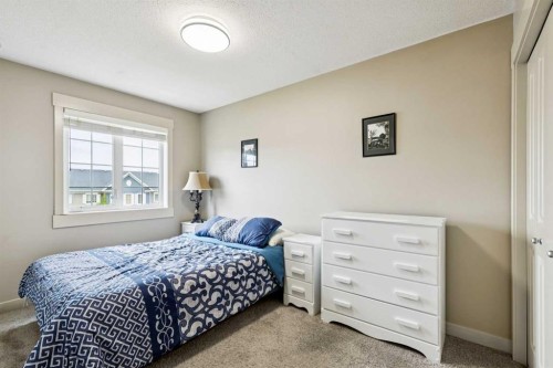 248 Cascades Pass, Chestermere, AB - Indoor Photo Showing Bedroom