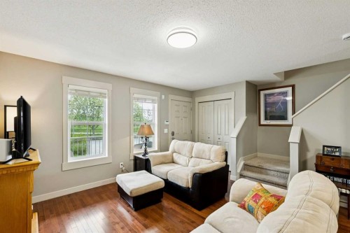 248 Cascades Pass, Chestermere, AB - Indoor Photo Showing Living Room