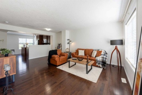 38 Cranford Drive Se, Calgary, AB - Indoor Photo Showing Living Room