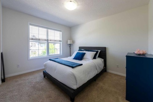 38 Cranford Drive Se, Calgary, AB - Indoor Photo Showing Bedroom