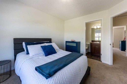 38 Cranford Drive Se, Calgary, AB - Indoor Photo Showing Bedroom