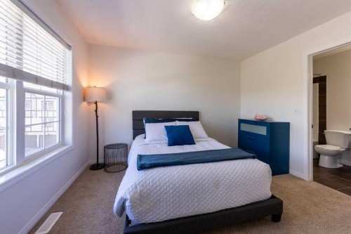 38 Cranford Drive Se, Calgary, AB - Indoor Photo Showing Bedroom