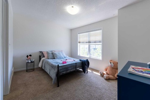 38 Cranford Drive Se, Calgary, AB - Indoor Photo Showing Bedroom