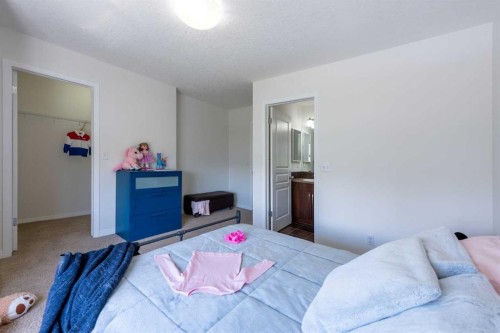 38 Cranford Drive Se, Calgary, AB - Indoor Photo Showing Bedroom