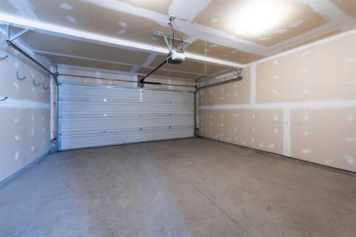 38 Cranford Drive Se, Calgary, AB - Indoor Photo Showing Garage