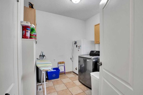 6 Strathridge Way Sw, Calgary, AB - Indoor Photo Showing Laundry Room