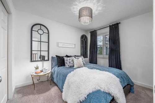 77 Everbrook Drive Sw, Calgary, AB - Indoor Photo Showing Bedroom