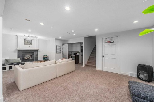 77 Everbrook Drive Sw, Calgary, AB - Indoor With Fireplace
