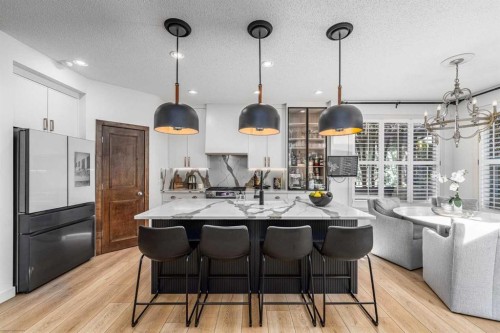 77 Everbrook Drive Sw, Calgary, AB - Indoor Photo Showing Kitchen With Upgraded Kitchen