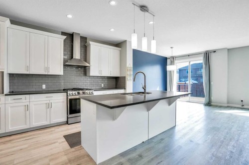 14 Evansfield Green Nw, Calgary, AB - Indoor Photo Showing Kitchen With Upgraded Kitchen