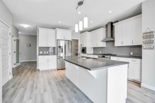 14 Evansfield Green Nw, Calgary, AB - Indoor Photo Showing Kitchen With Stainless Steel Kitchen With Upgraded Kitchen