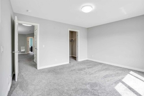 14 Evansfield Green Nw, Calgary, AB - Indoor Photo Showing Other Room