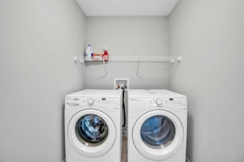 14 Evansfield Green Nw, Calgary, AB - Indoor Photo Showing Laundry Room