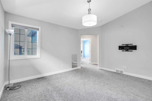 14 Evansfield Green Nw, Calgary, AB - Indoor Photo Showing Other Room