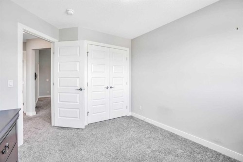 14 Evansfield Green Nw, Calgary, AB - Indoor Photo Showing Other Room