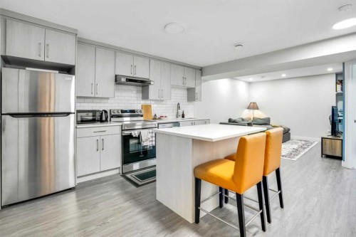 14 Evansfield Green Nw, Calgary, AB - Indoor Photo Showing Kitchen With Stainless Steel Kitchen With Upgraded Kitchen