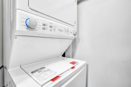 14 Evansfield Green Nw, Calgary, AB - Indoor Photo Showing Laundry Room