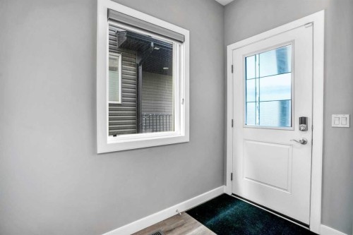 14 Evansfield Green Nw, Calgary, AB - Indoor Photo Showing Other Room