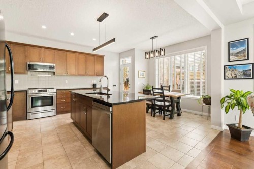 728 Windridge Road Sw, Airdrie, AB - Indoor Photo Showing Kitchen