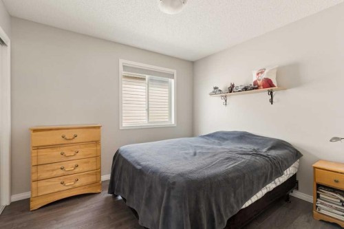 728 Windridge Road Sw, Airdrie, AB - Indoor Photo Showing Bedroom