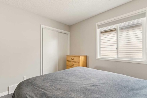 728 Windridge Road Sw, Airdrie, AB - Indoor Photo Showing Bedroom