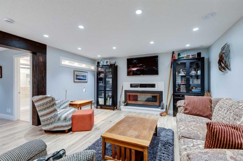 89 Douglasdale Crescent Se, Calgary, AB - Indoor Photo Showing Living Room With Fireplace