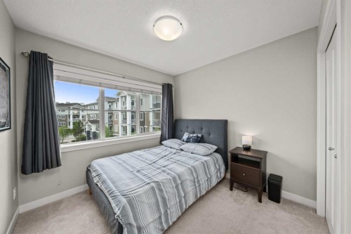 536 Cranford Drive Se, Calgary, AB - Indoor Photo Showing Bedroom
