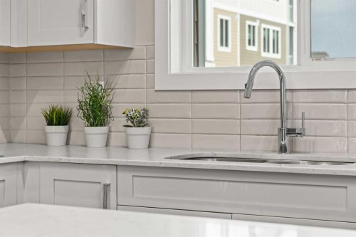 536 Cranford Drive Se, Calgary, AB - Indoor Photo Showing Kitchen With Double Sink
