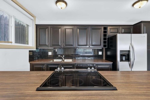103-2020 11 Avenue Sw, Calgary, AB - Indoor Photo Showing Kitchen With Double Sink