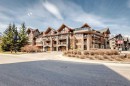 403-505 Spring Creek Drive, Canmore, AB  - Outdoor With Facade 